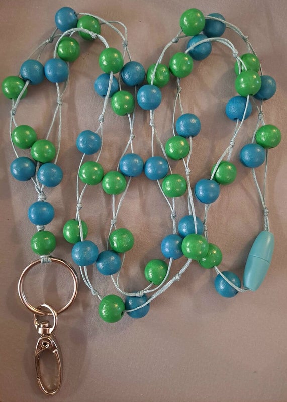 Mets&auml; vihre&auml;-petroli (puuhelmet)