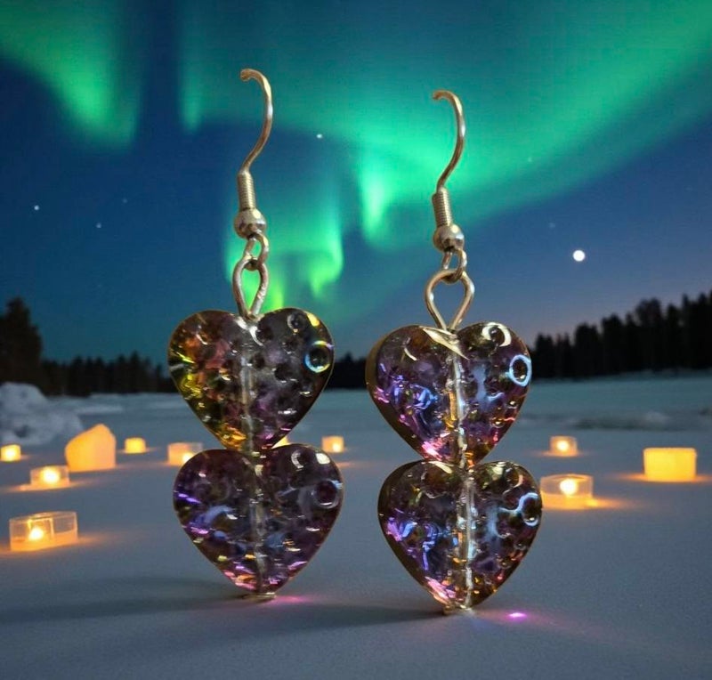 Kahden syd&auml;men revontulisyd&auml;n korvakorut