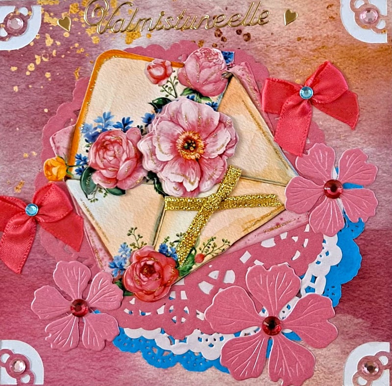 Valmistuneelle punaiset kukat ja pitsi